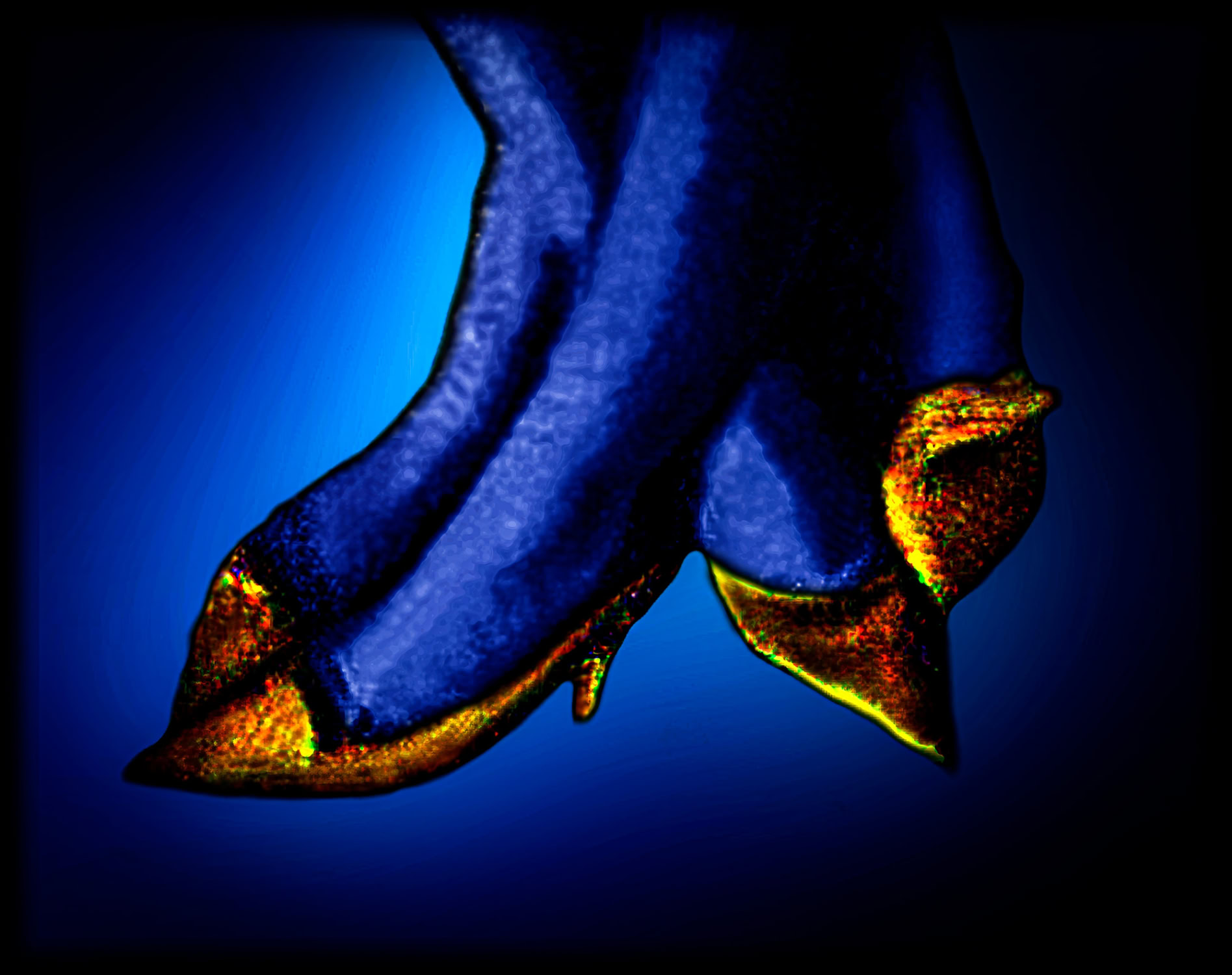 Two pairs of gold shoes.