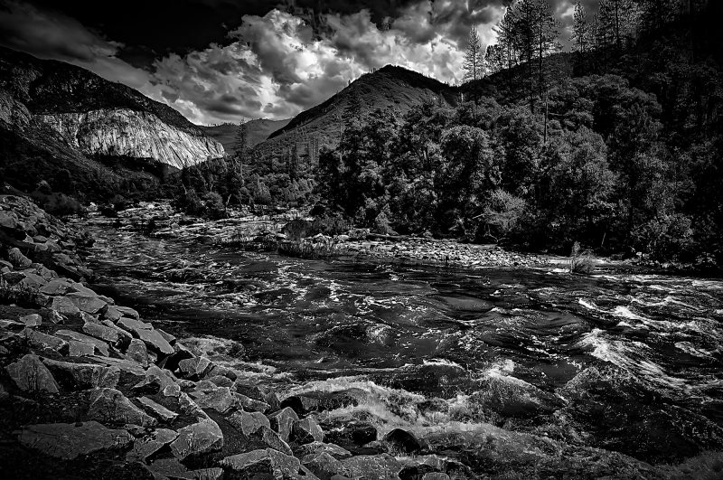 Rugged mountain river landscape in black and white, part of The Doug Heslep Fine Art Collection.