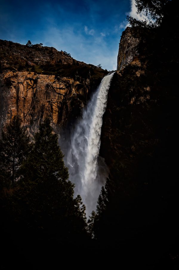 Majestic waterfall in Yosemite National Park, part of The Doug Heslep Fine Art Collection.