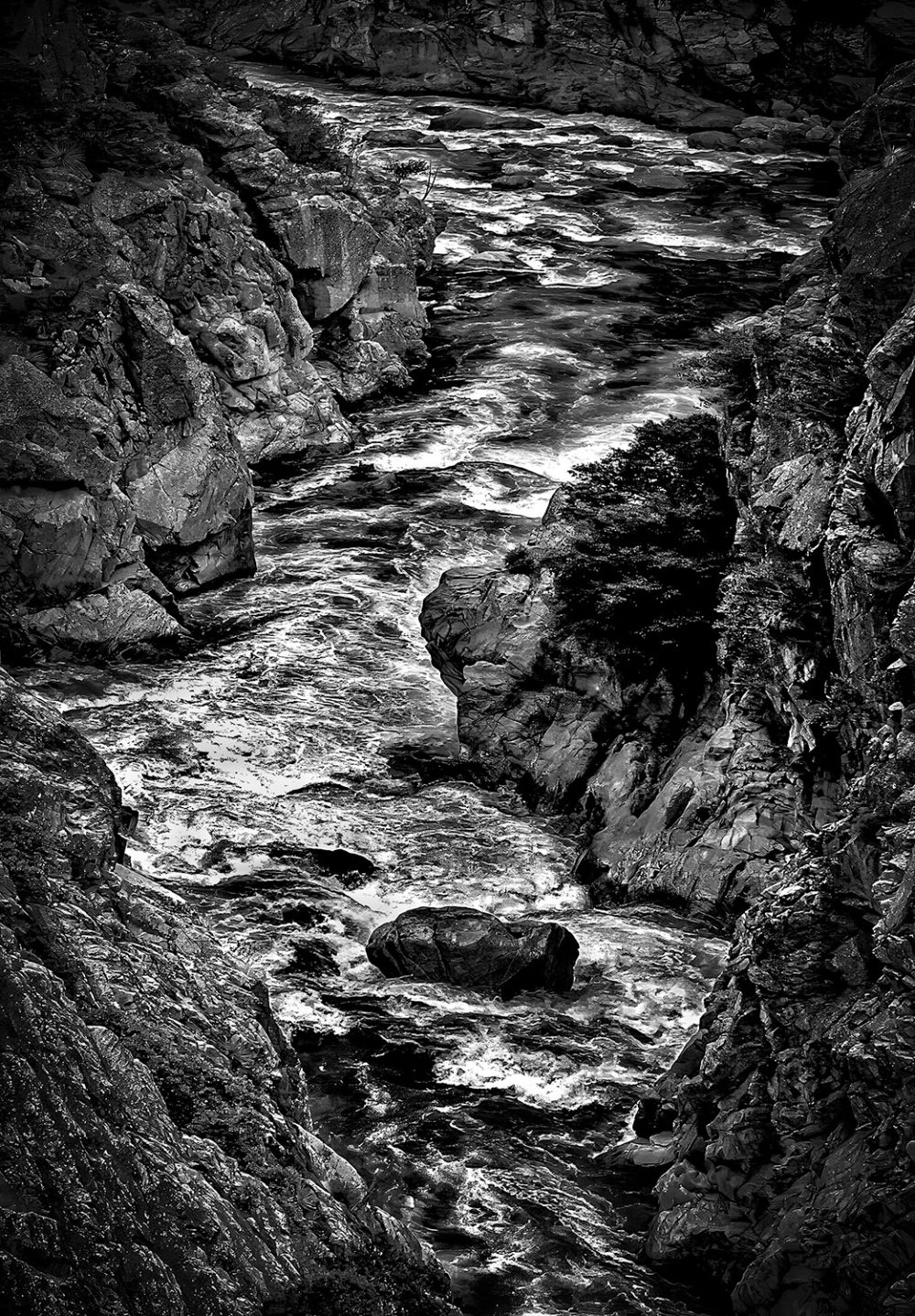 roaring mountain river in black and white artwork