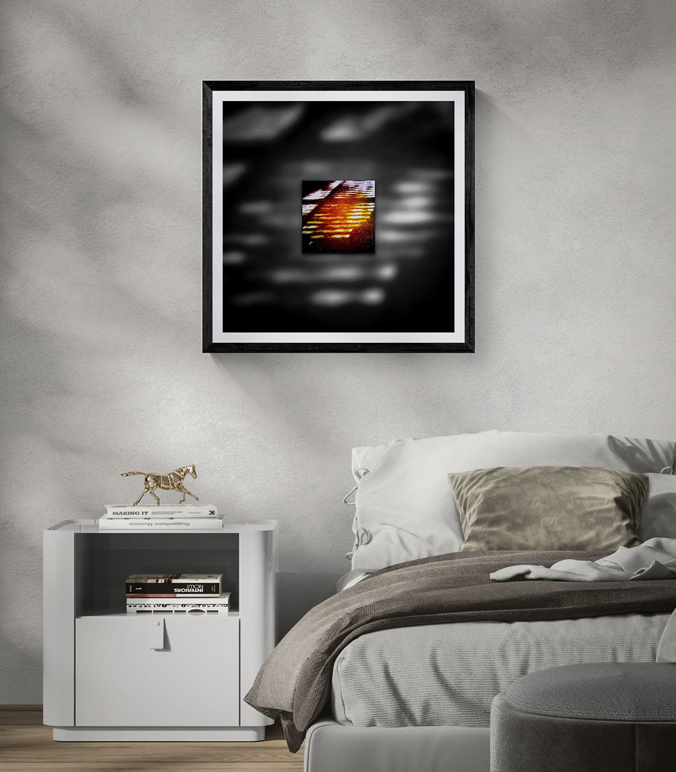 Abstract artwork with light and shadow in black and white frame.