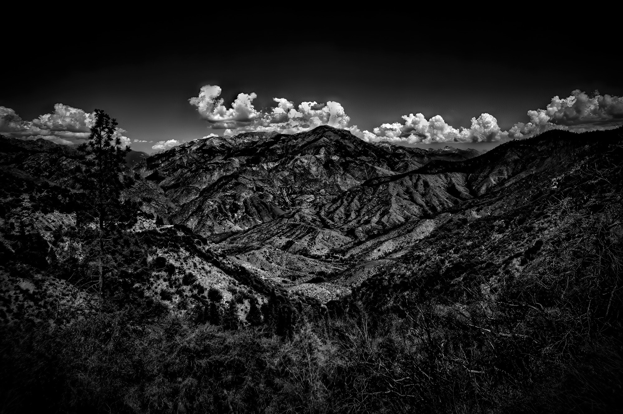 Rugged mountain landscape in black and white, part of The Doug Heslep Fine Art Collection.