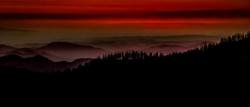 Vibrant mountain landscape at sunset, part of The Doug Heslep Fine Art Collection.