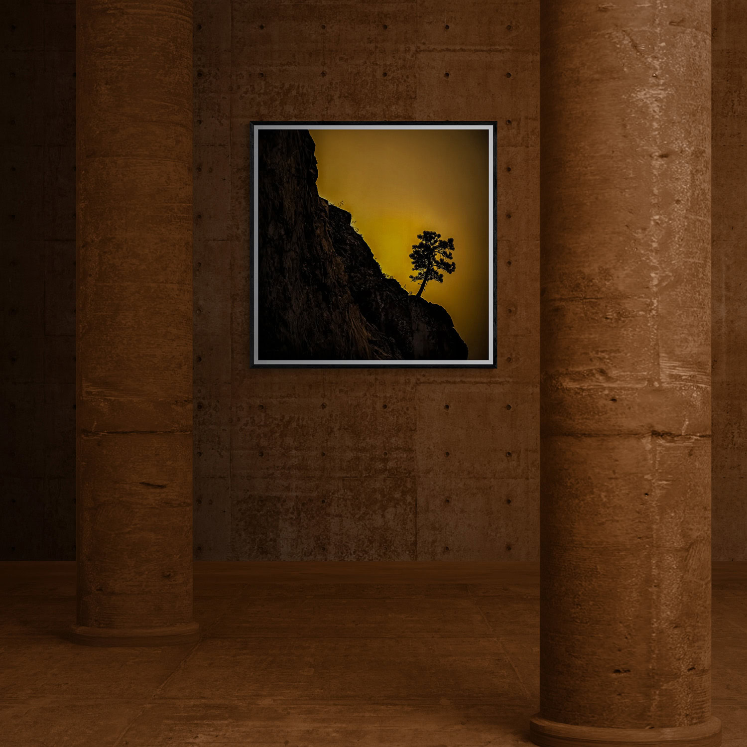 Silhouette of a lone tree on a mountain at sunset, part of The Doug Heslep Fine Art Collection.