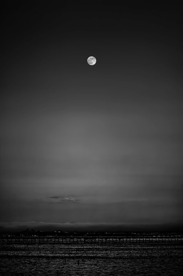 Moon over water landscape, black and white photography, The Doug Heslep Fine Art Collection.