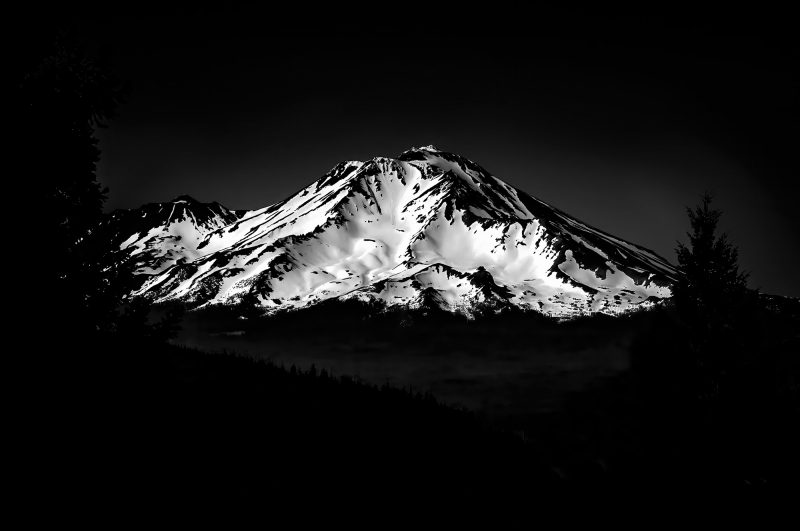 Snow-capped mountain in black and white, part of The Doug Heslep Fine Art Collection.