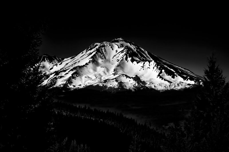 Snow-capped mountain landscape in monochrome, part of The Doug Heslep Fine Art Collection.