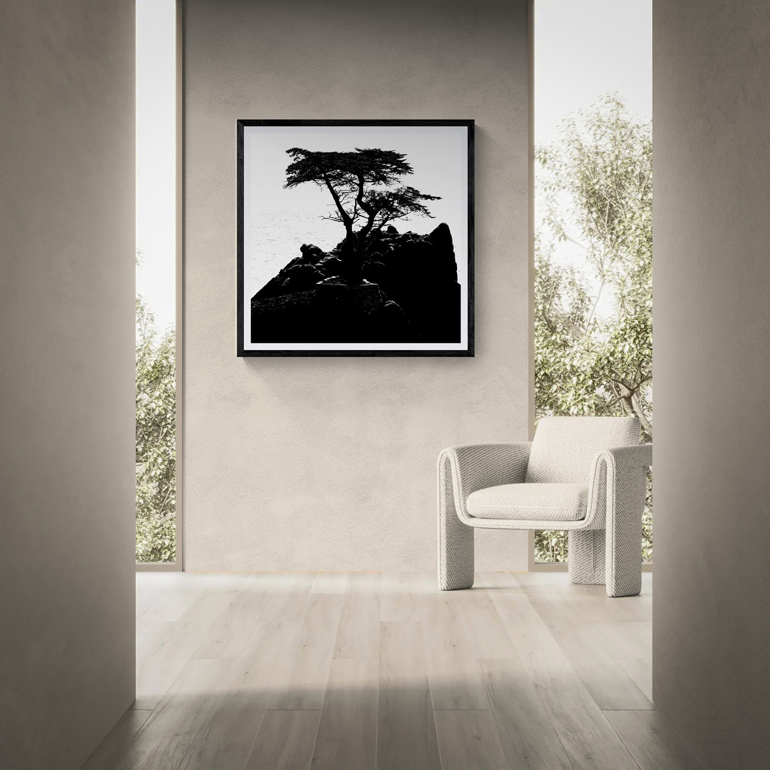 Black and white tree silhouette artwork displayed in modern interior setting.