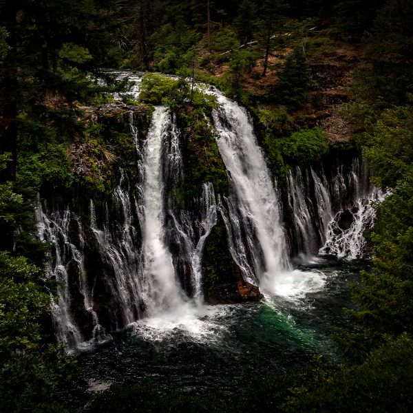 A full view of Burney Falls from halfway down the descending trail. Burney Falls, in the Cascade Region of Northeastern California, offered a truly stunning experience. There were so many great viewpoints of this magnificent destination. All were breathtaking! This view is from the observation deck at the entrance.