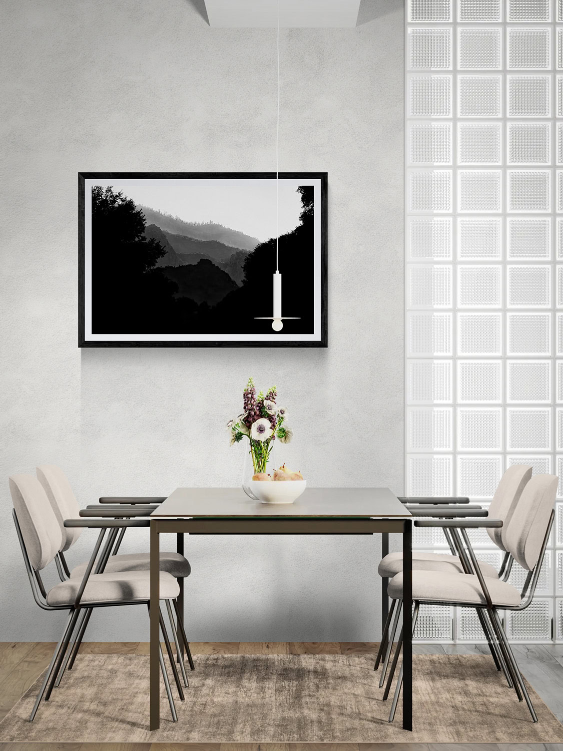 Contemporary dining room featuring minimalist decor and a black-and-white mountain landscape artwork.