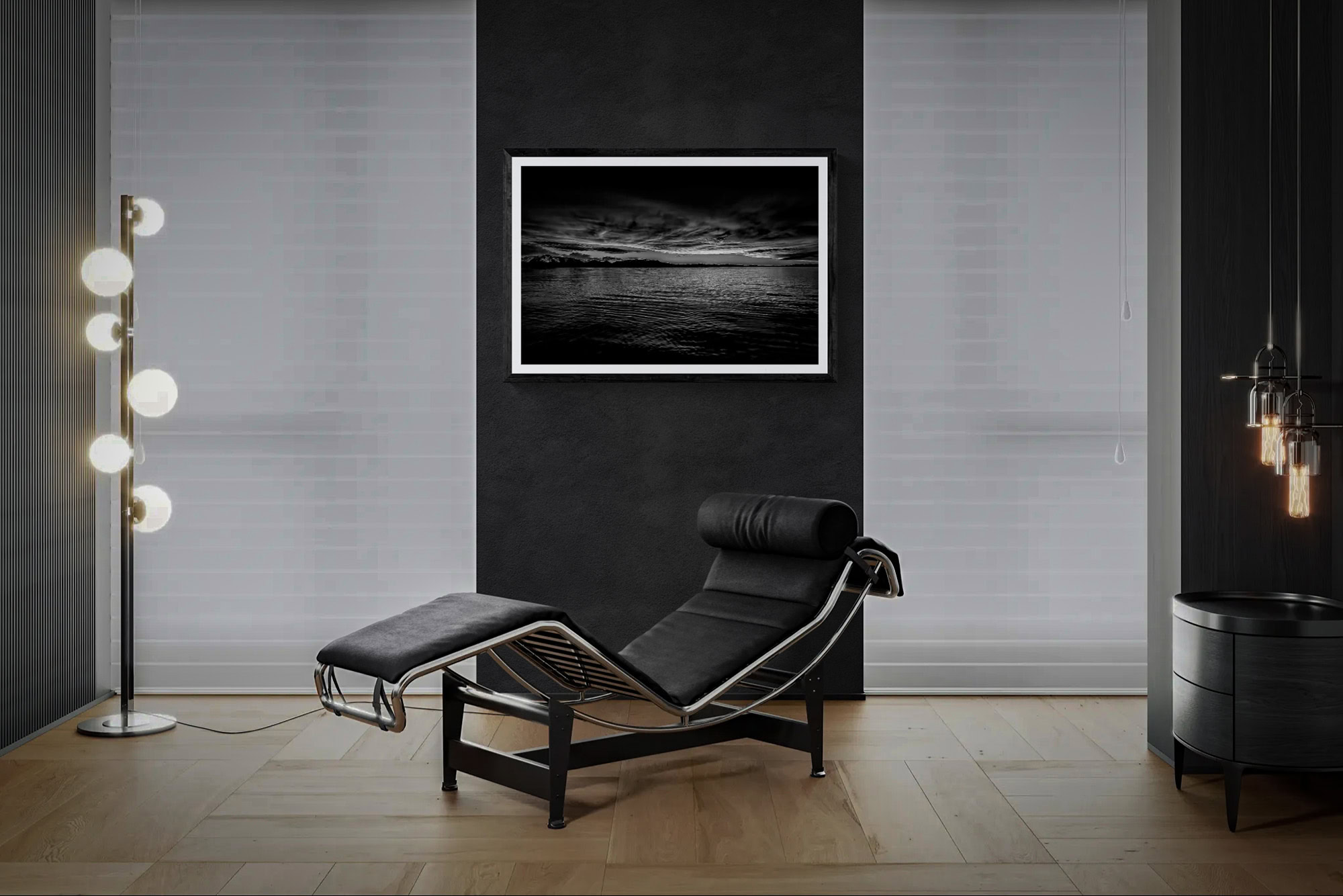 Contemporary living room with black lounge chair and modern decor.