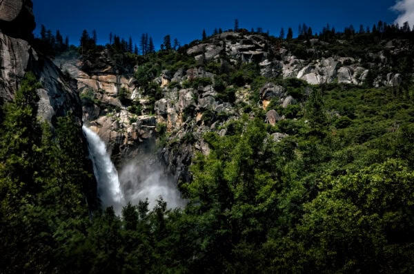 Cascade Falls in Yosemite flows beautifully amongst the dense forest