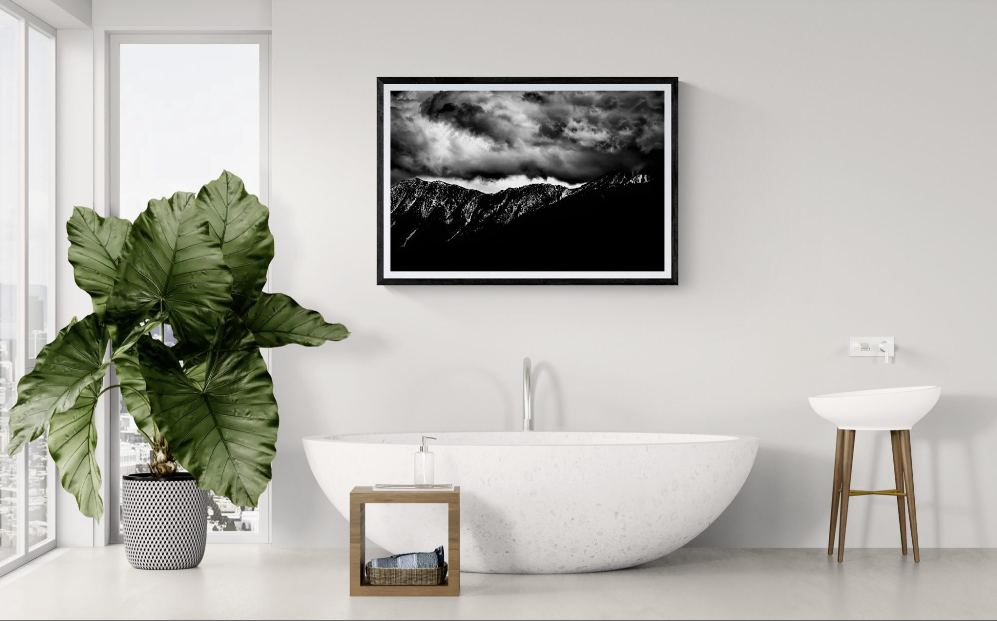 Elegant modern bathroom featuring a white freestanding bathtub, large green plant, and black-and-whi.