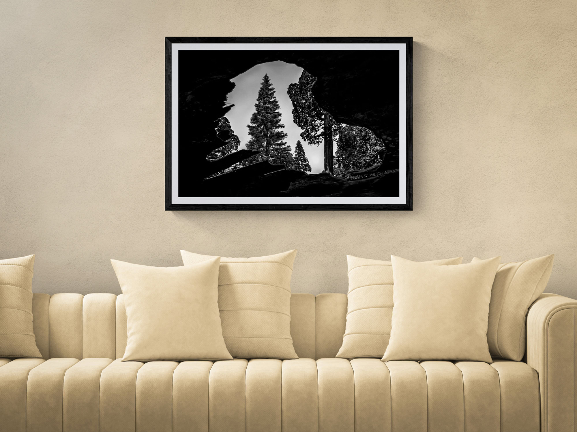 Black and white mountain landscape artwork by Doug Heslep in a modern living room.