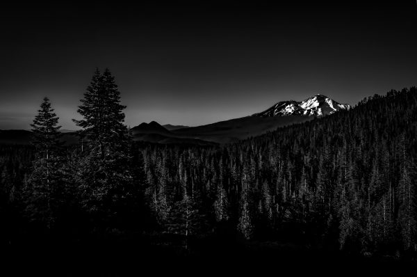 An evening view of Mount Shasta and Black Butte as seen from Castle Lake in B&W