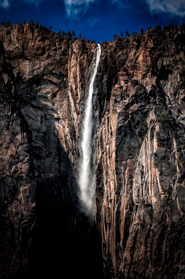 The wind blown flow of Ribbon Fall in Yosemite National Park.