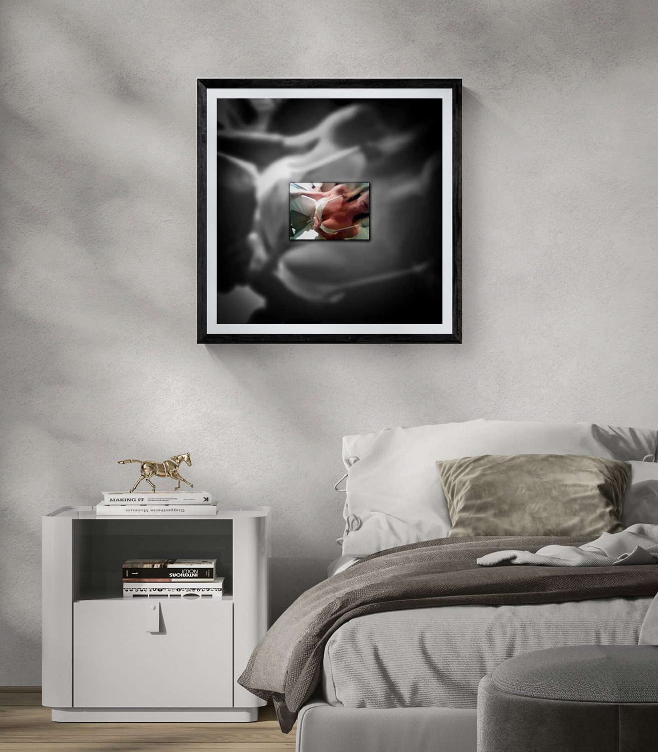 Modern black and white framed artwork in stylish bedroom setting.