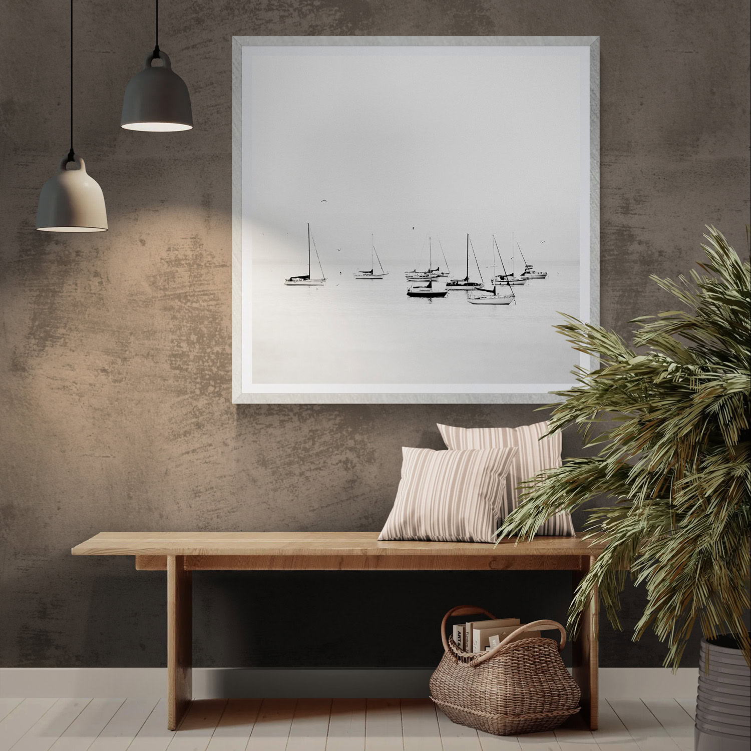 Minimalist interior with a large framed boat scene and cozy seating area.