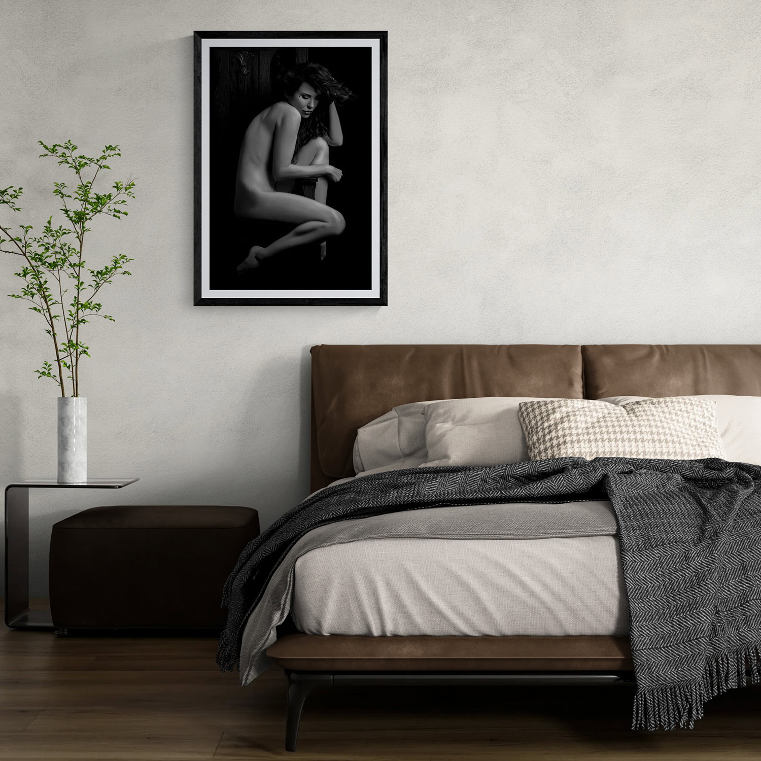 Black and white nude portrait artwork in modern bedroom setting.
