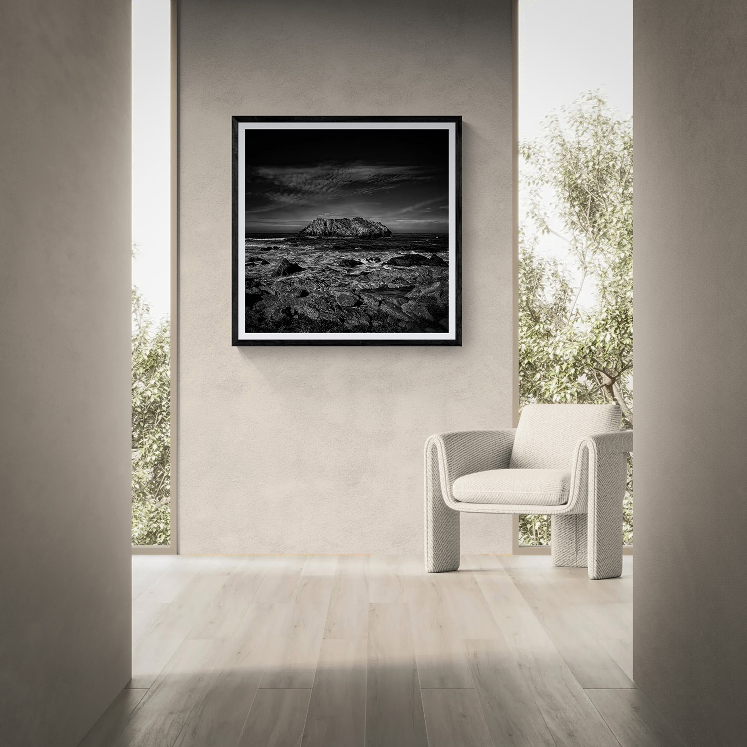 Black and white mountain landscape artwork displayed in modern gallery setting.