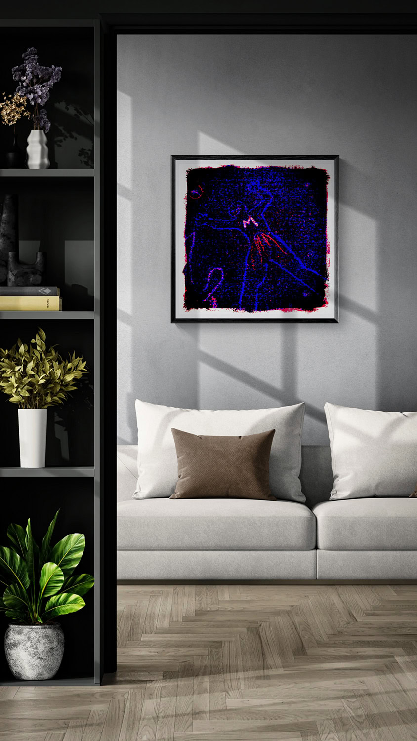 Child’s Play by Doug Heslep, displayed as framed abstract art with vivid blue and red tones above a contemporary white sofa.