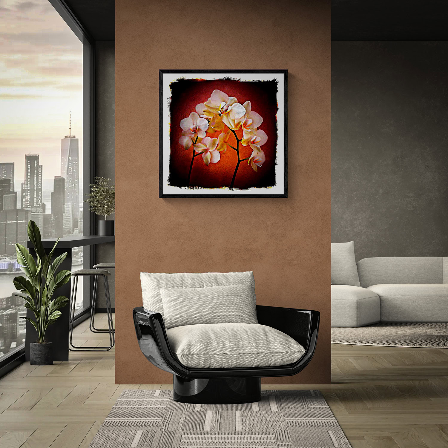 “Orchid Fire,” featuring pale orchids against a red-orange background, framed above a cream-cushioned black chair beside a city-view window.
