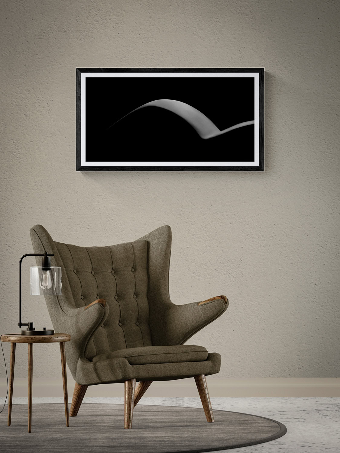 Rimlight Nude Series Plate 1 by Doug Heslep, displayed as framed black-and-white fine art above a sculptural lounge chair in a warm contemporary interior.